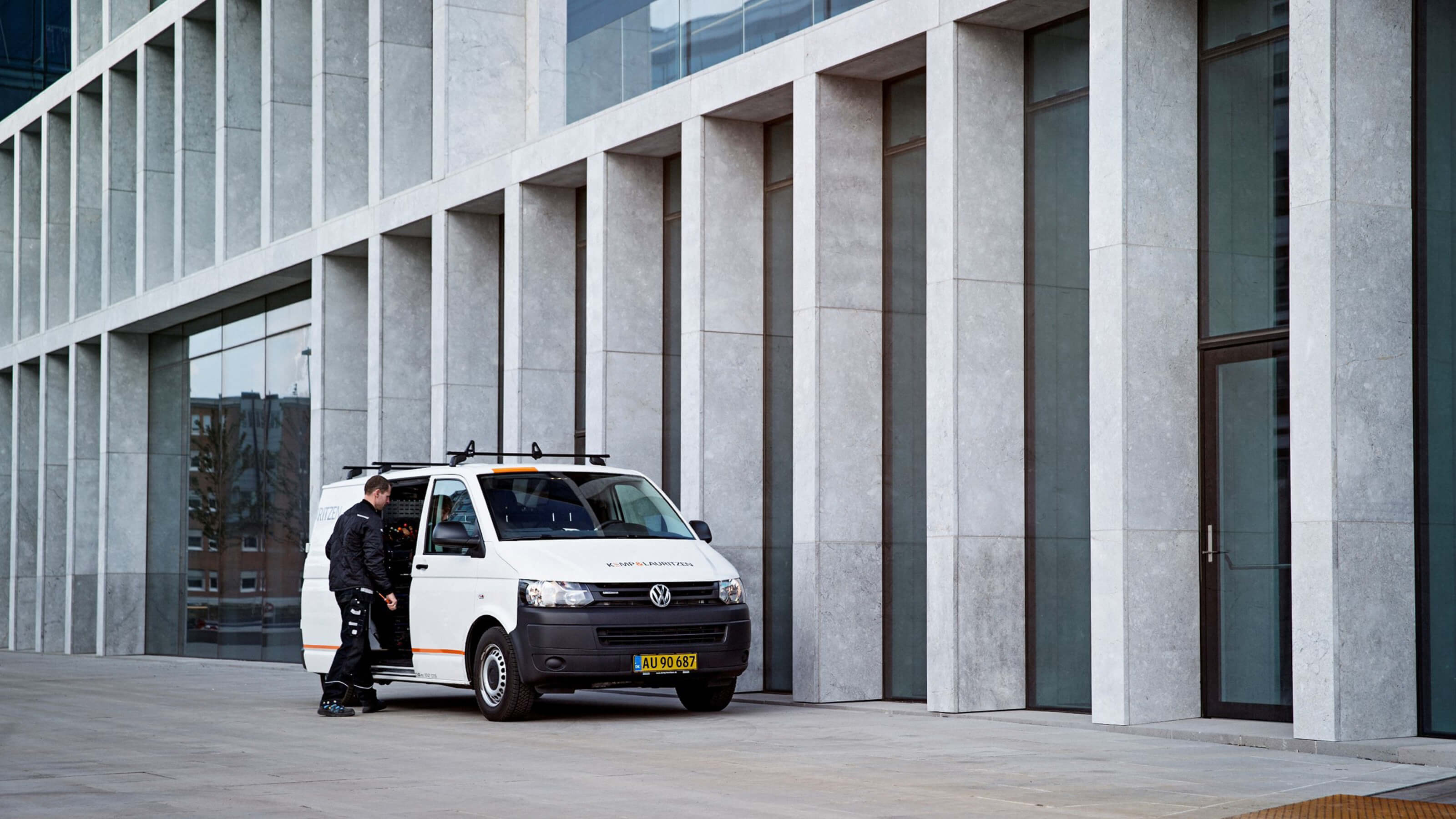 van in front of a building