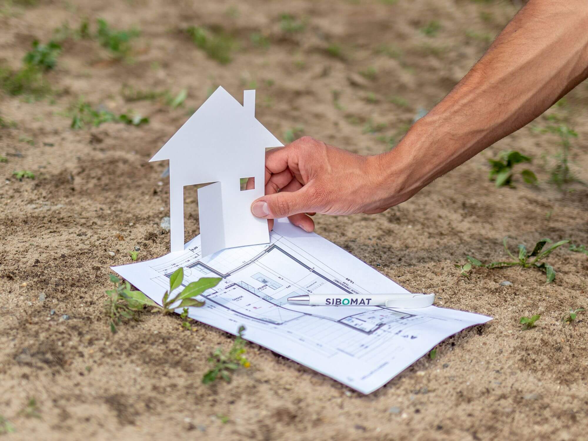 cut-out house made of paper