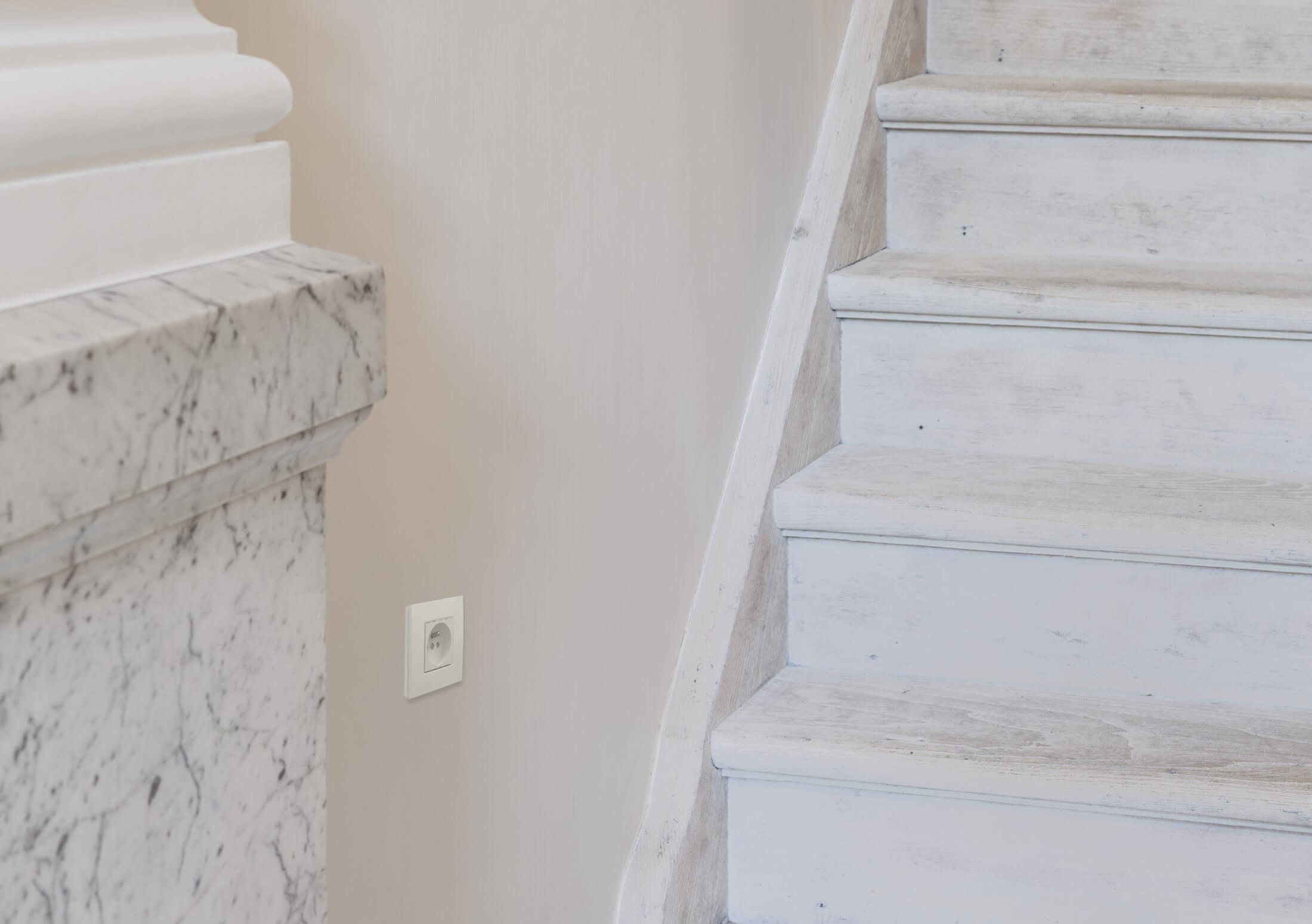 White socket at the stairs